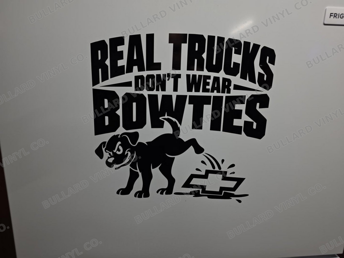 Our finished Real Trucks Don't Wear Bowties dog decal in black vinyl on a white garage refrigerator at Bullard Vinyl Co.; Bullard Vinyl Co. watermarked product preview.